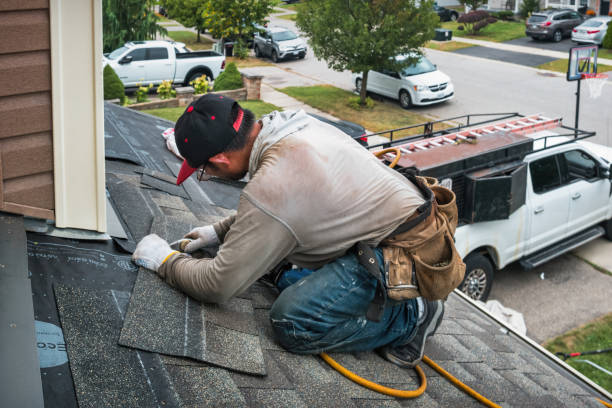 Professional Roofing technician working in Rio, VA